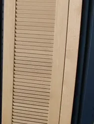 درب کرکره ای کلاسیک با روکش چوب بلوط: تلفیق امنیت و زیبایی در دکوراسیون داخلی