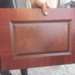 طراحی و ساخت کابینت دو رنگ سبز و نارنجی